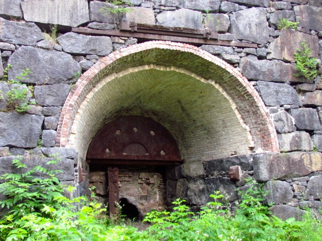Close up of the arched earth opening 